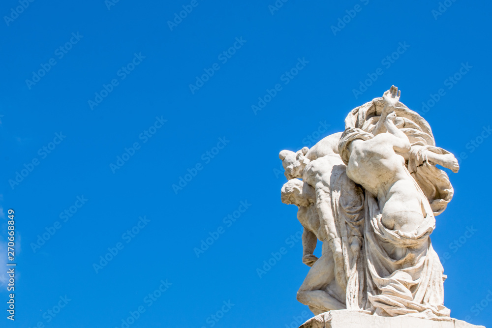 The kiss of the statues in front of Altare della Patria,  Piazza Venezia, Rome Italy