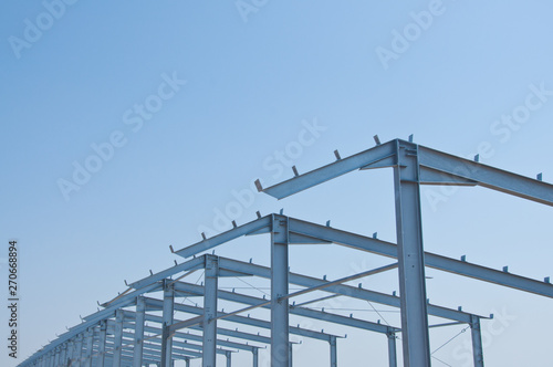 Structure of steel for building construction. The steel structure of the new building for further construction. Metal frame for the installation of insulation panels.