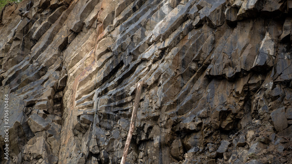 Cracks in the cave in basalt rocks