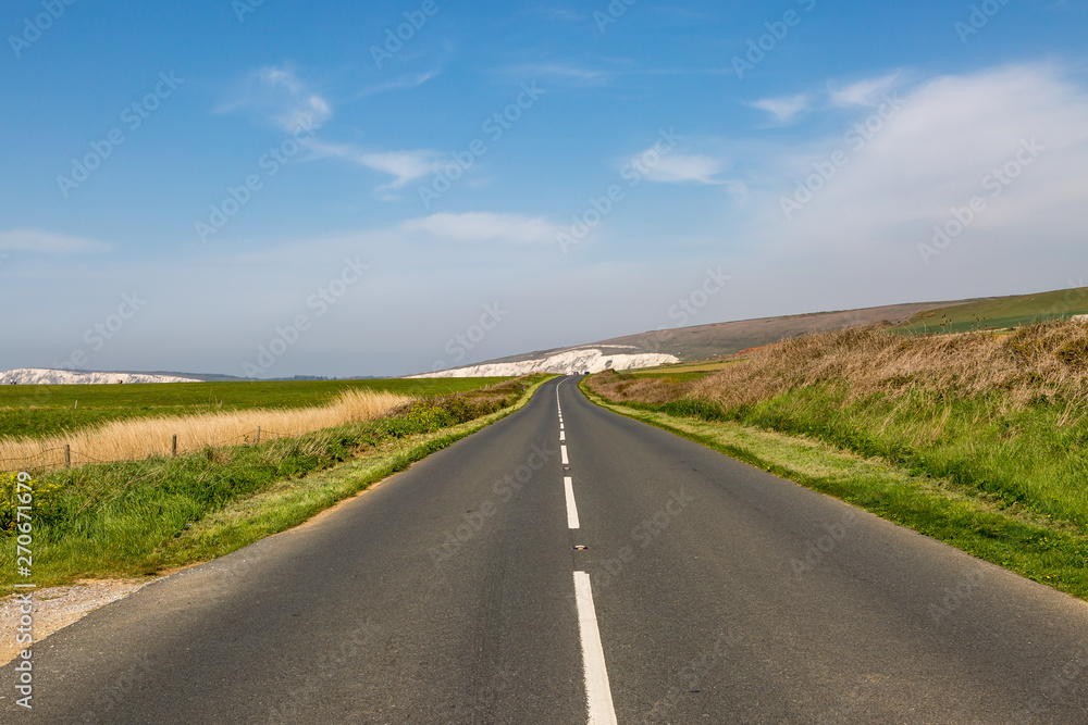 Looking along the Military Road  on the Isle of Wight, with chalk coastal cliffs in the distance
