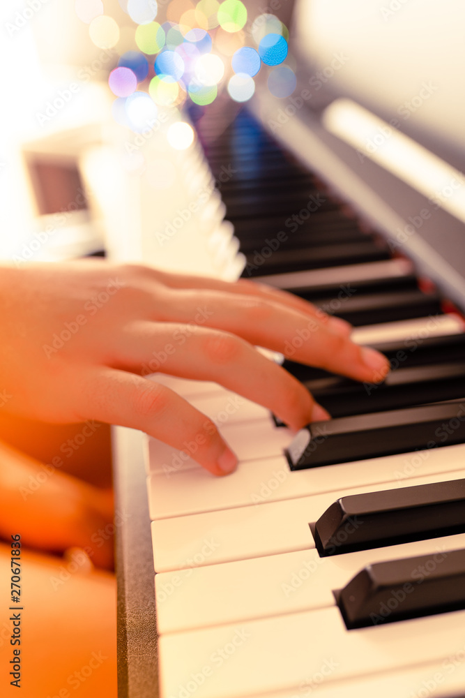 Fototapeta premium piano keys and playing piano