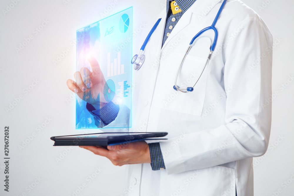Doctor interacts with virtual screen of new technology for medicine. Doctor interacts with virtual screen of new technology for medicine.