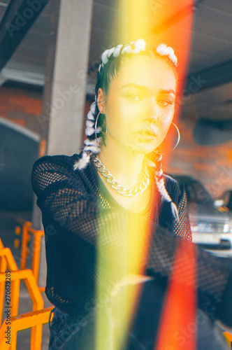Confident swag woman in red light