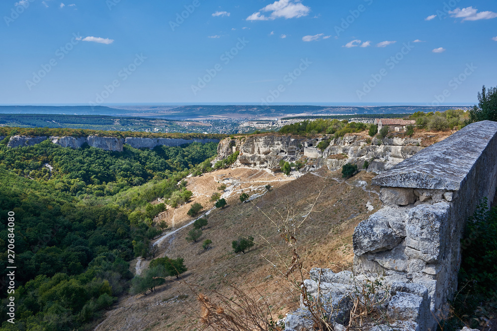 Russia. Crimea. Chufut-kale. South wall. View to the west and the valley of Maryam-Dere Russia. Crimea. Chufut-kale. South wall. View to the west and the valley of Maryam-Dere