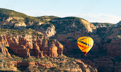 Hot air balloon ride over the bueatiful red rock cliffs of Sedona Arizona