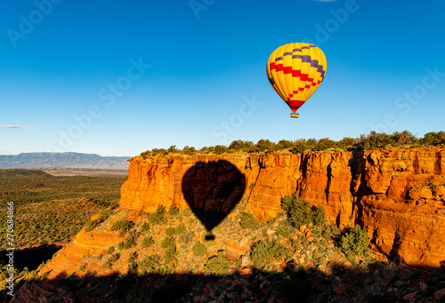 Hot air balloon ride over the bueatiful red rock cliffs of Sedona Arizona
