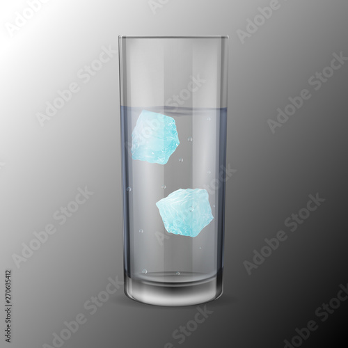 Glass with alcohol or water and two ice cubes