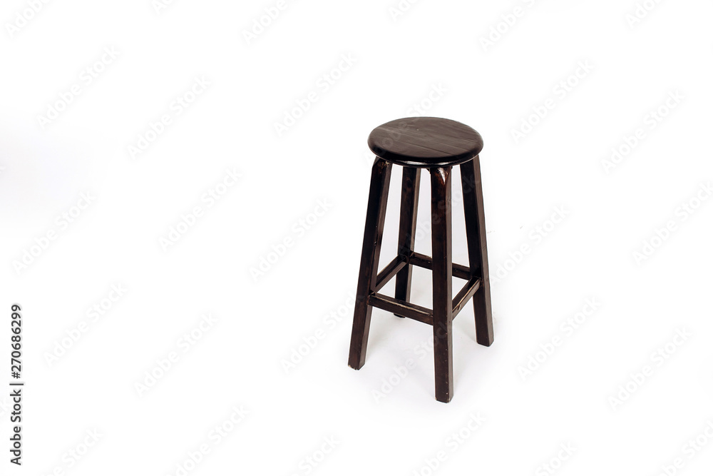 wooden chair on a white background. bar stool made of dark wood. wooden chair on a white background. bar stool made of dark wood.