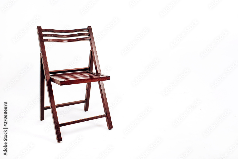 wooden chair on a white background. garden folding chair made of wood. wooden chair on a white background. garden folding chair made of wood.