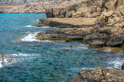 A large boulder broke off from the coastal cliff.