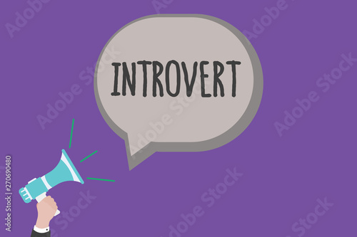 Handwriting text Introvert. Concept meaning tend to be inward turning or focused more internal thoughts. © Artur