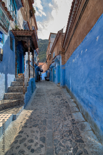 Traditional street of Chaouen, the so-called blue city because of the color of its houses. Chaouen is one of the most visited places by tourists from around the world in Morocco © juanorihuela