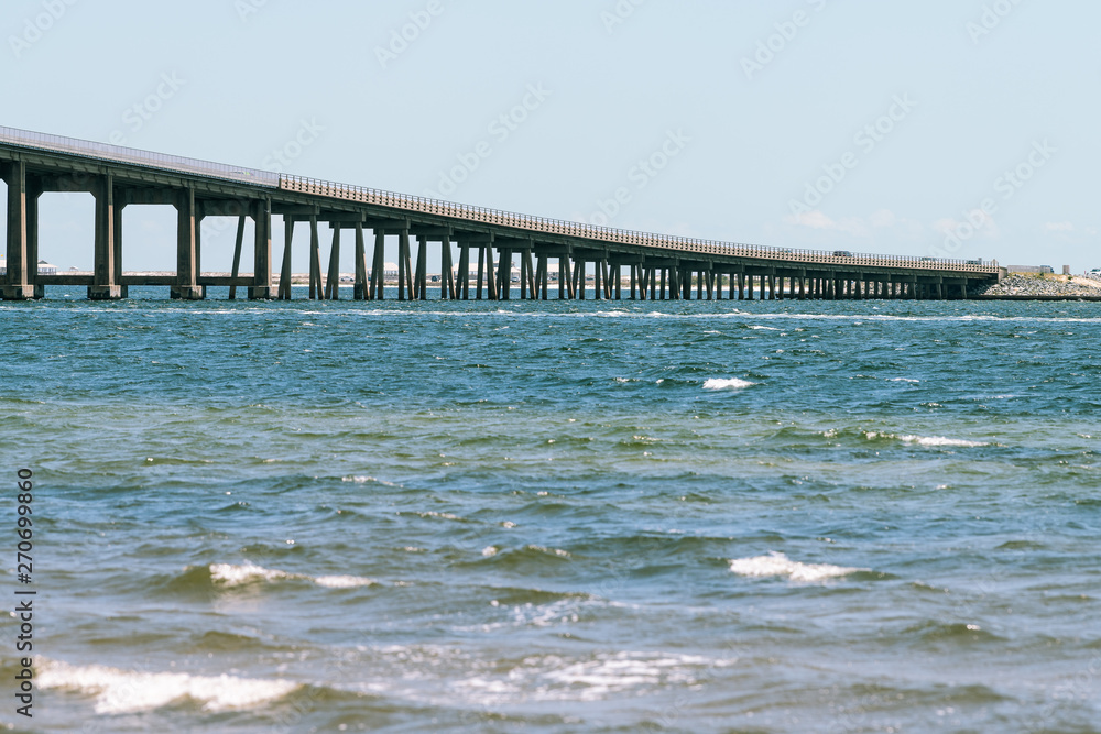 Pensacola bay bridge on US route highway road 98 with traffic cars in Navarre, Florida Panhandle near Gulf of Mexico of Emerald Coast