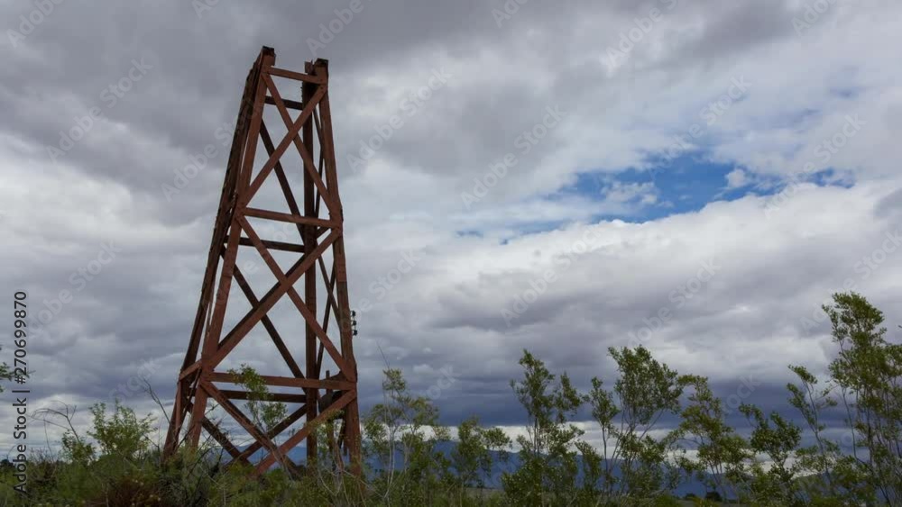 Time Lapse of Clouds Passing Over a Old Water Tower Time Lapse of Clouds Passing Over a Old Water Tower