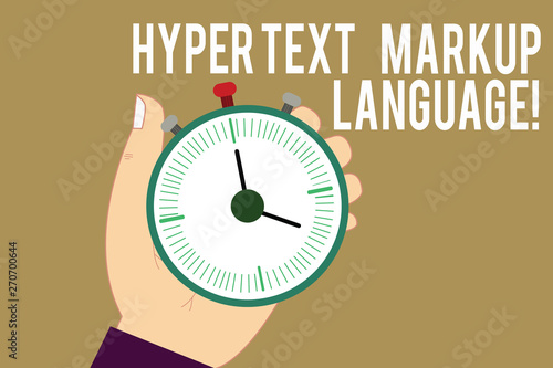 Writing note showing Hyper Text Markup Language. Business photo showcasing Standard languages for the creation of websites Hu analysis Hand Holding Stop Watch Timer with Start Stop Button