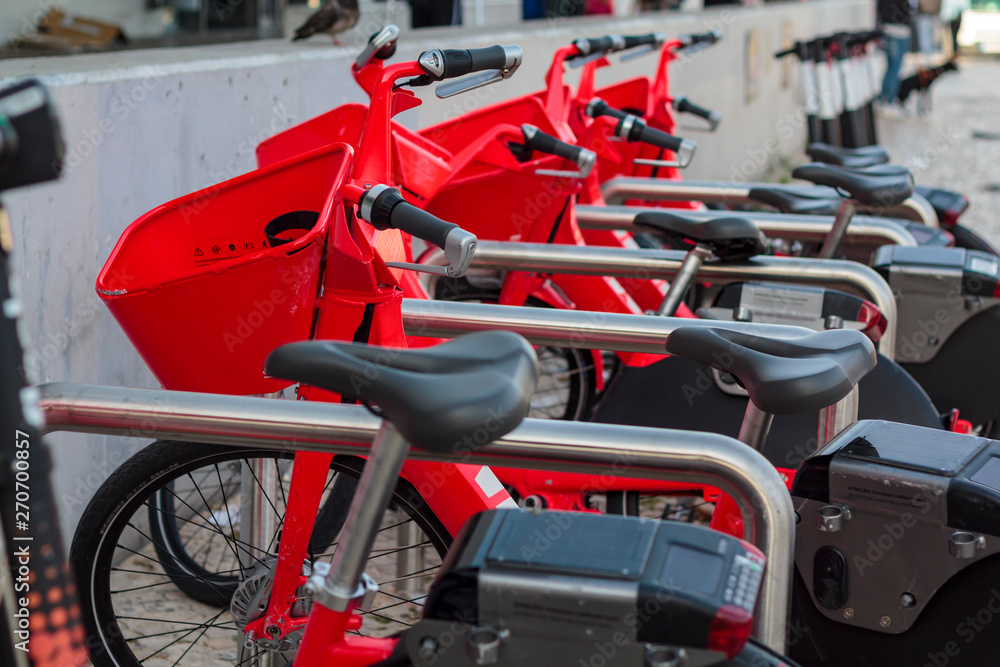 Fototapeta premium Row of parked electric bicycles