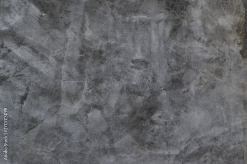 Grunge concrete wall with crack and stains. Cement texture for design and background.