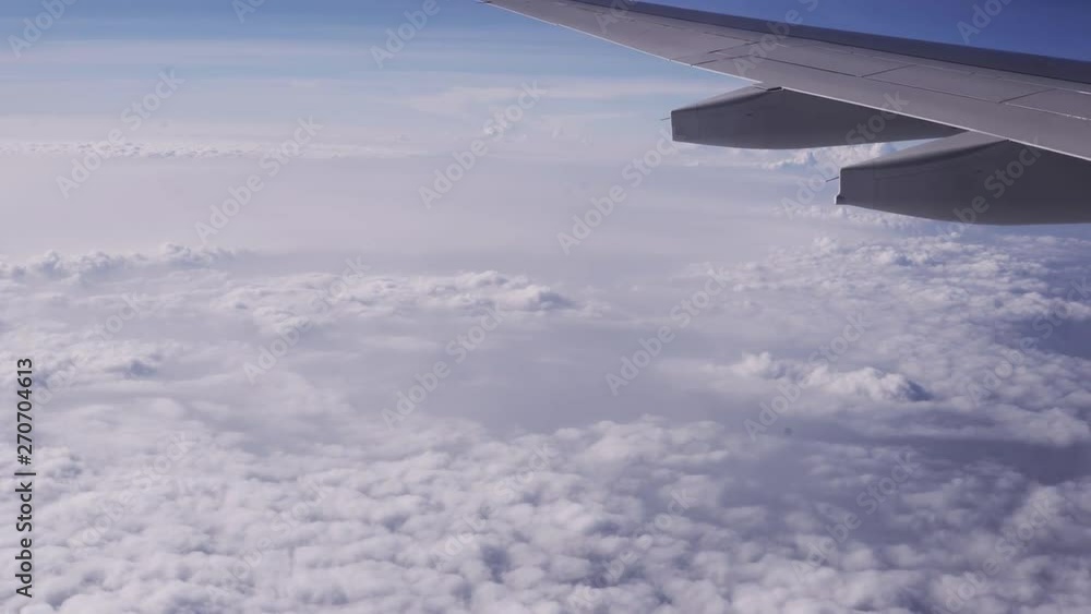 BEAUTIFUL AERIAL VIEW OF CLOUDS SKY FROM AIRPLANE, with wing cover one third of image on top right BEAUTIFUL AERIAL VIEW OF CLOUDS SKY FROM AIRPLANE, with wing cover one third of image on top right