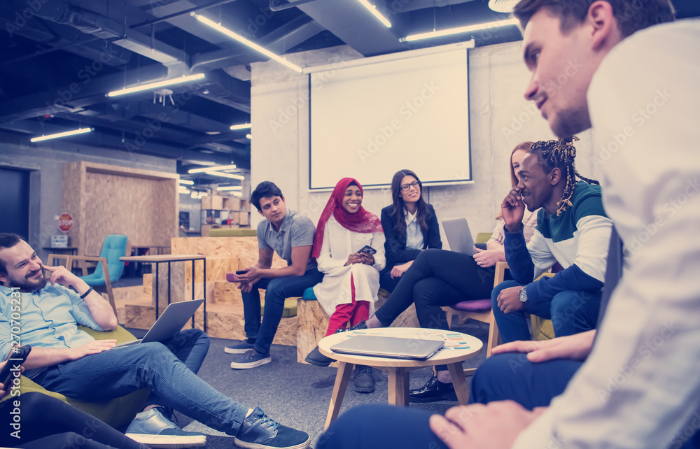 Multiethnic startup business team having meeting Multiethnic startup business team having meeting