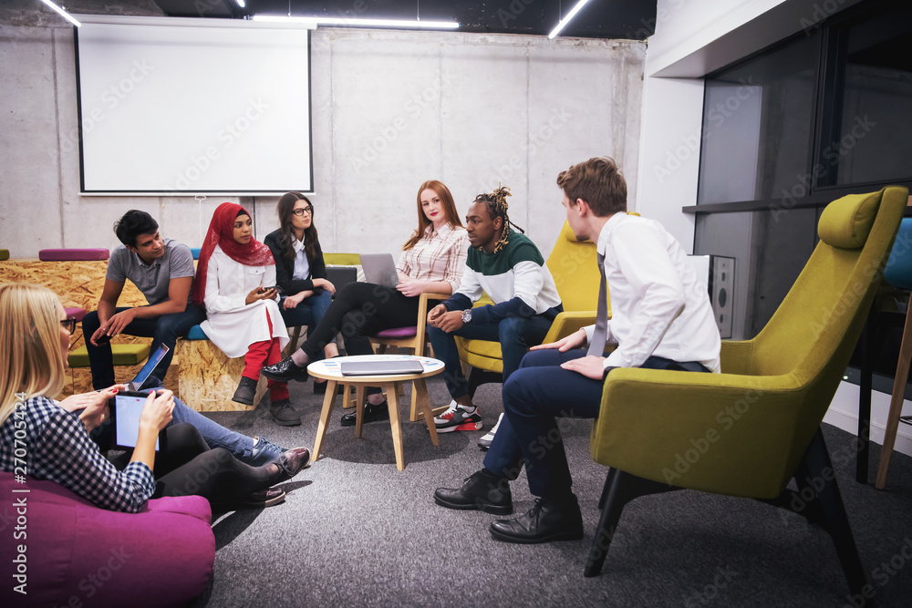 Multiethnic startup business team having meeting Multiethnic startup business team having meeting