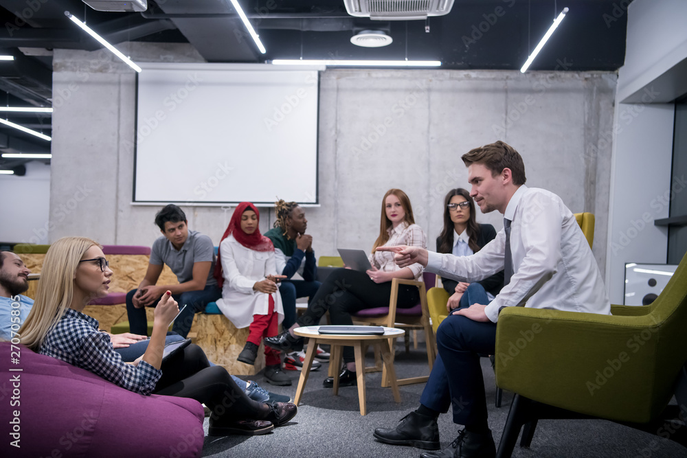 Multiethnic startup business team having meeting Multiethnic startup business team having meeting