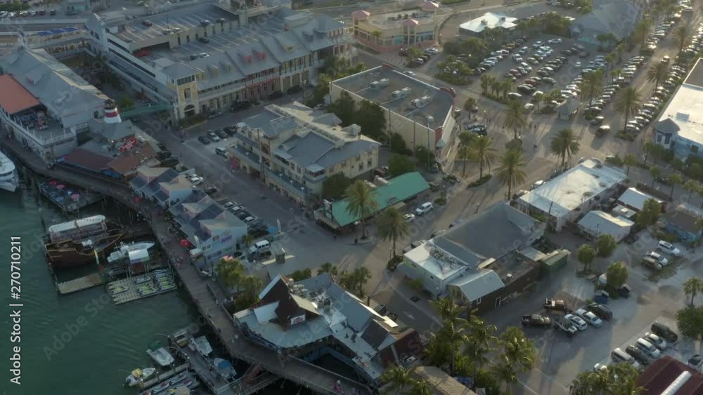 Aerial of John's Pass Village and Boardwalk at sunset in Madeira Beach Florida, located on the outskirts of Tampa Bay in Pinellas County. Aerial of John's Pass Village and Boardwalk at sunset in Madeira Beach Florida, located on the outskirts of Tampa Bay in Pinellas County.