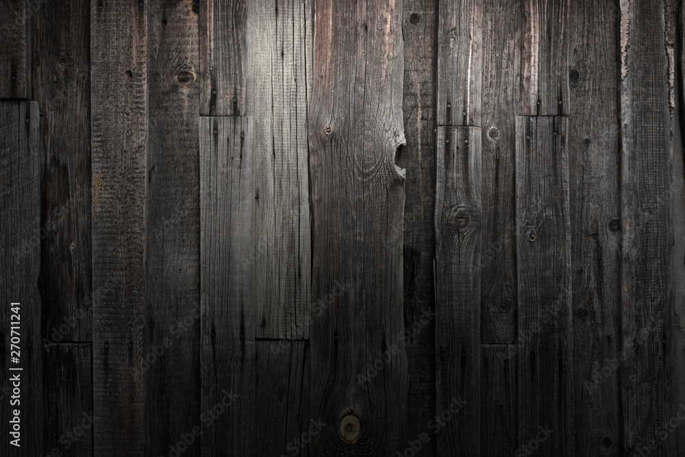 Naklejka premium Dark wooden background