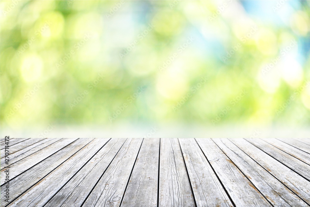 Empty wooden surface on blurred background Empty wooden surface on blurred background