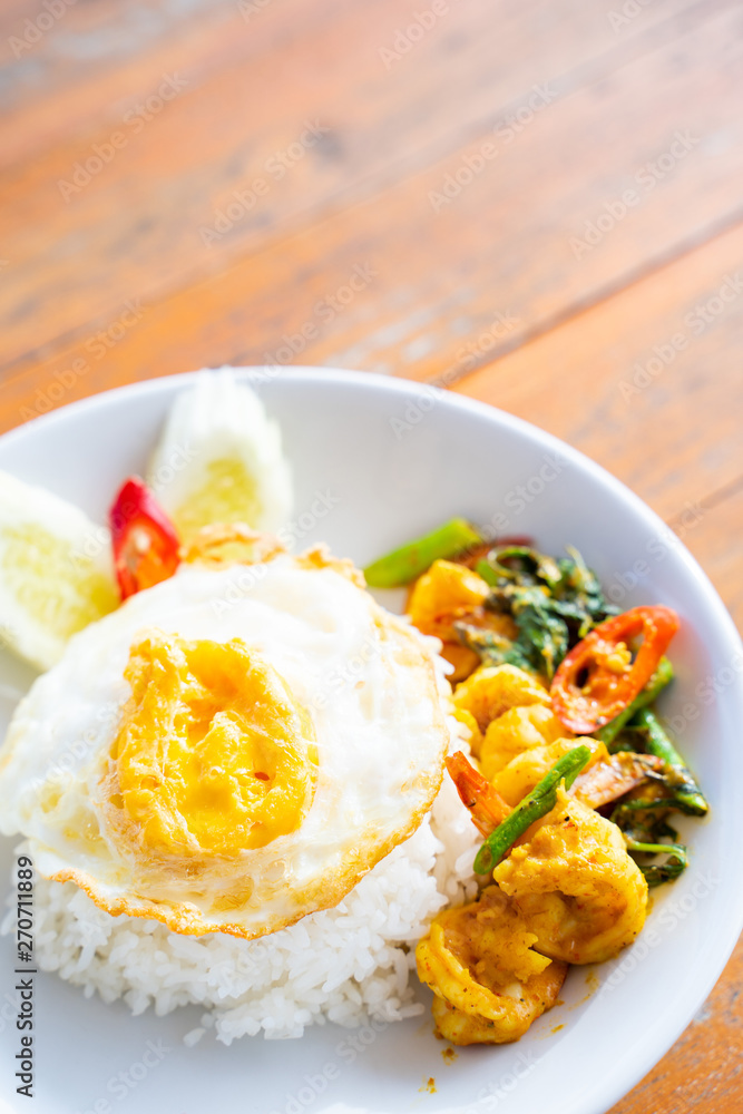 stir fried curry with shrimp and fried egg stir fried curry with shrimp and fried egg