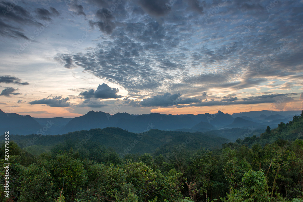 Scenic landscape view of mountains and cloudy sky in Thailand