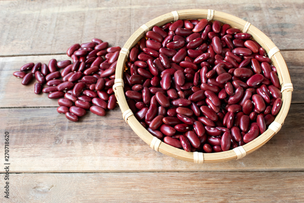 red bean in bowl isolated on wood background red bean in bowl isolated on wood background