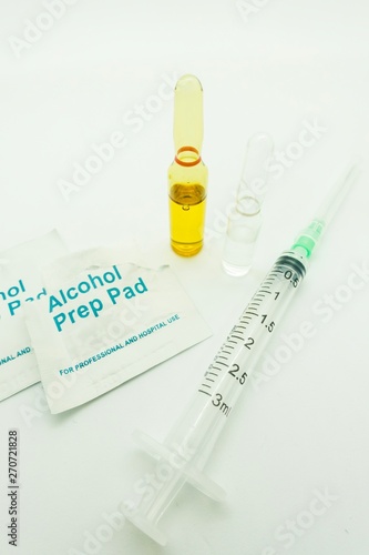 Medication ampoules for Intravenous injections on wooden background, medical concept