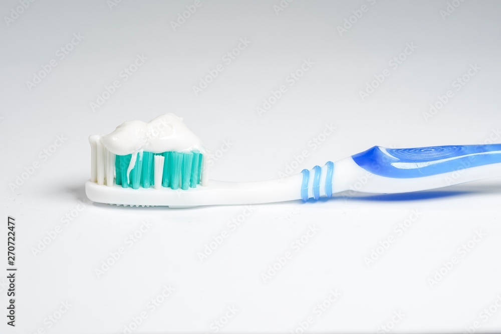 Toothbrush with toothpaste isolated on white background Toothbrush with toothpaste isolated on white background