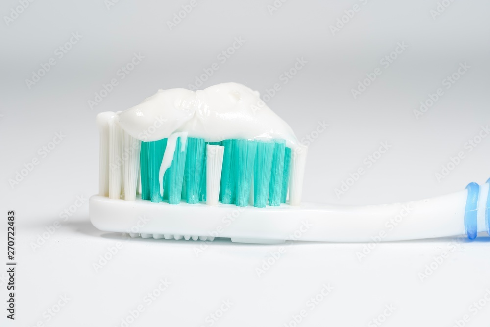 Toothbrush with toothpaste isolated on white background Toothbrush with toothpaste isolated on white background