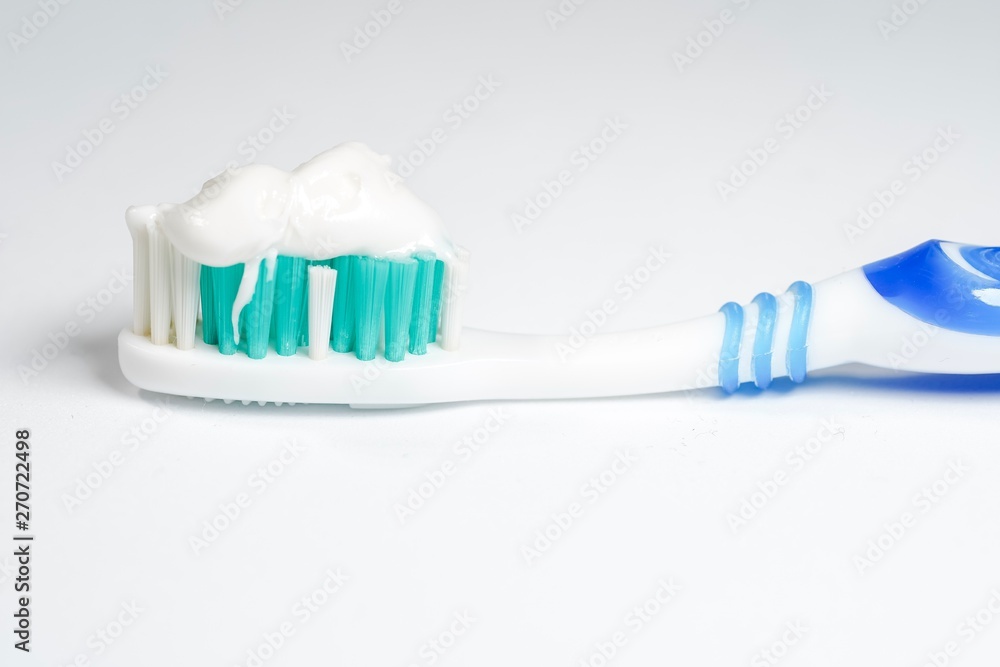 Toothbrush with toothpaste isolated on white background Toothbrush with toothpaste isolated on white background