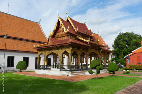 Photography The exterior view of the National Museum with green grass lawn in Bangkok,Thaila