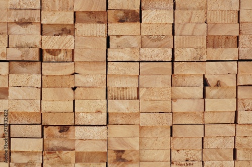 cross section of arranged timber brown wood for backgrounds 