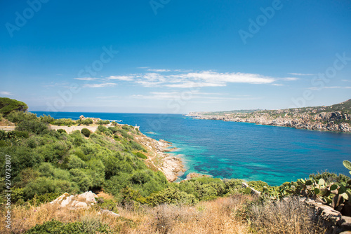 Landscape with Sea, Stones, Road and Coast of Santa Teresa di Gallura in North Sardinia Island.