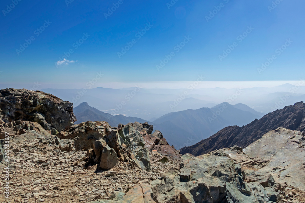 Mountain summit view with landscape of Andes and Aconcagua on clear day in La Campana National park in central Chile, South America Mountain summit view with landscape of Andes and Aconcagua on clear day in La Campana National park in central Chile, South America