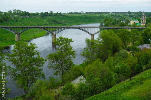 Image of the riverbed of the Volga and the bridge over it in the old town of Staritsa, Russia