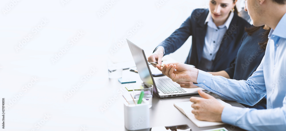 Professional business team working together at desk - obrazy, fototapety, plakaty 
