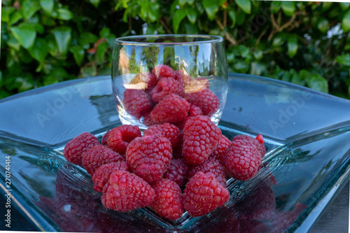 Rapsberries on bowl photo