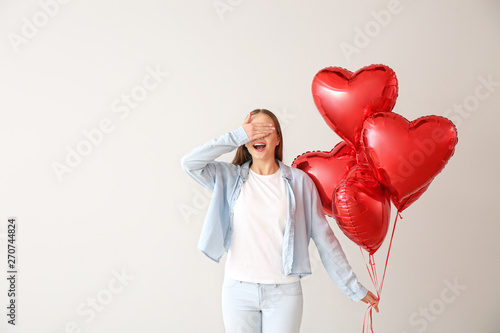 Beautiful young woman with ...