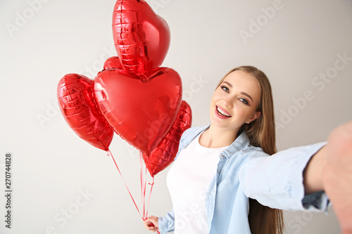 Beautiful young woman with ...
