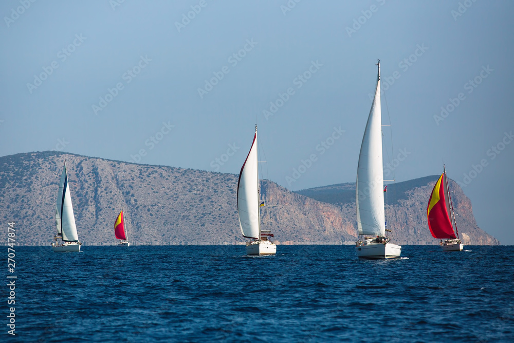 Sailing yacht boats in regatta at the Aegean Sea - Greece. Sailing yacht boats in regatta at the Aegean Sea - Greece.