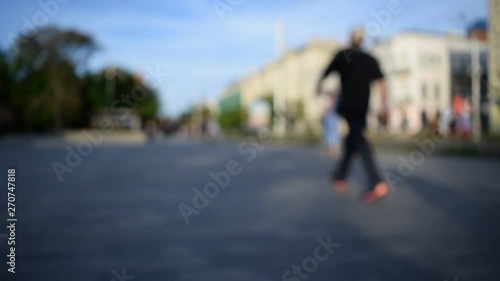 Wallpaper Mural Blurred background, people walk on the sidewalk and cars drive Torontodigital.ca