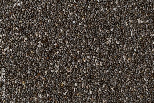 Chia seeds as texture background. Healthy superfood. Close-up of Chia seeds, space for text. 