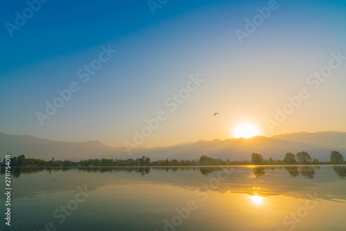 Sunrise on Dal lake  Kashmir India .