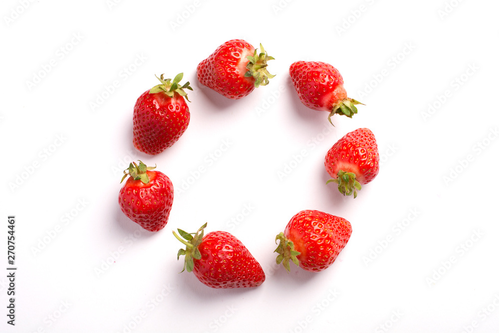 Strawberry creative pattern. Ripe red berry on white background Strawberry creative pattern. Ripe red berry on white background