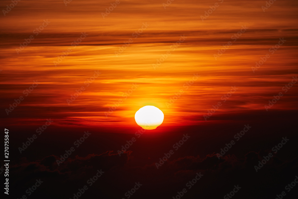 Sunrise / sunset over the clouds and horizon in golden colors. Sunrise / sunset over the clouds and horizon in golden colors.